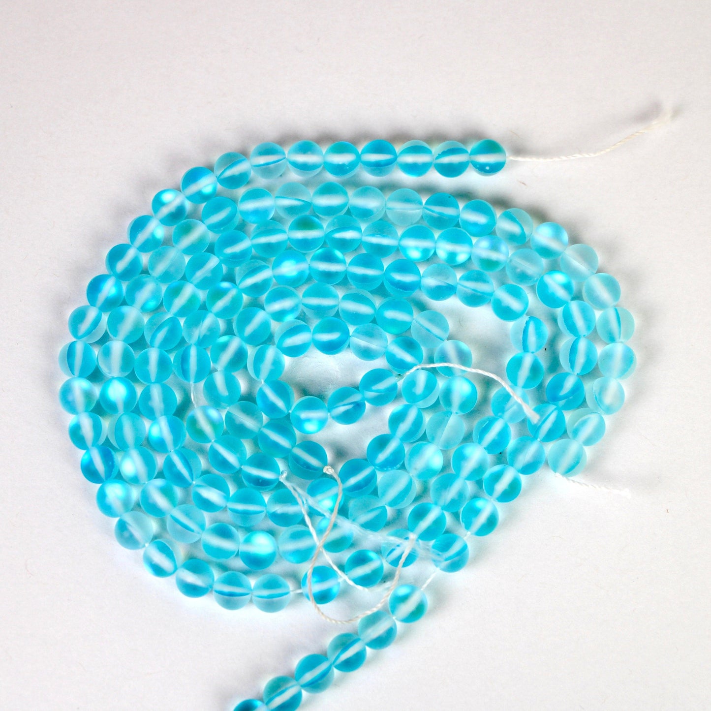 Wholesale 5 strands of Aqua Blue Aura Quartz Gemstone Beads, Matte Blue Mystic Aura Quartz, round 8 mm beads 15 inches strand | Healing Crystal - Healing Crystal for Energy, Meditation, and Balance