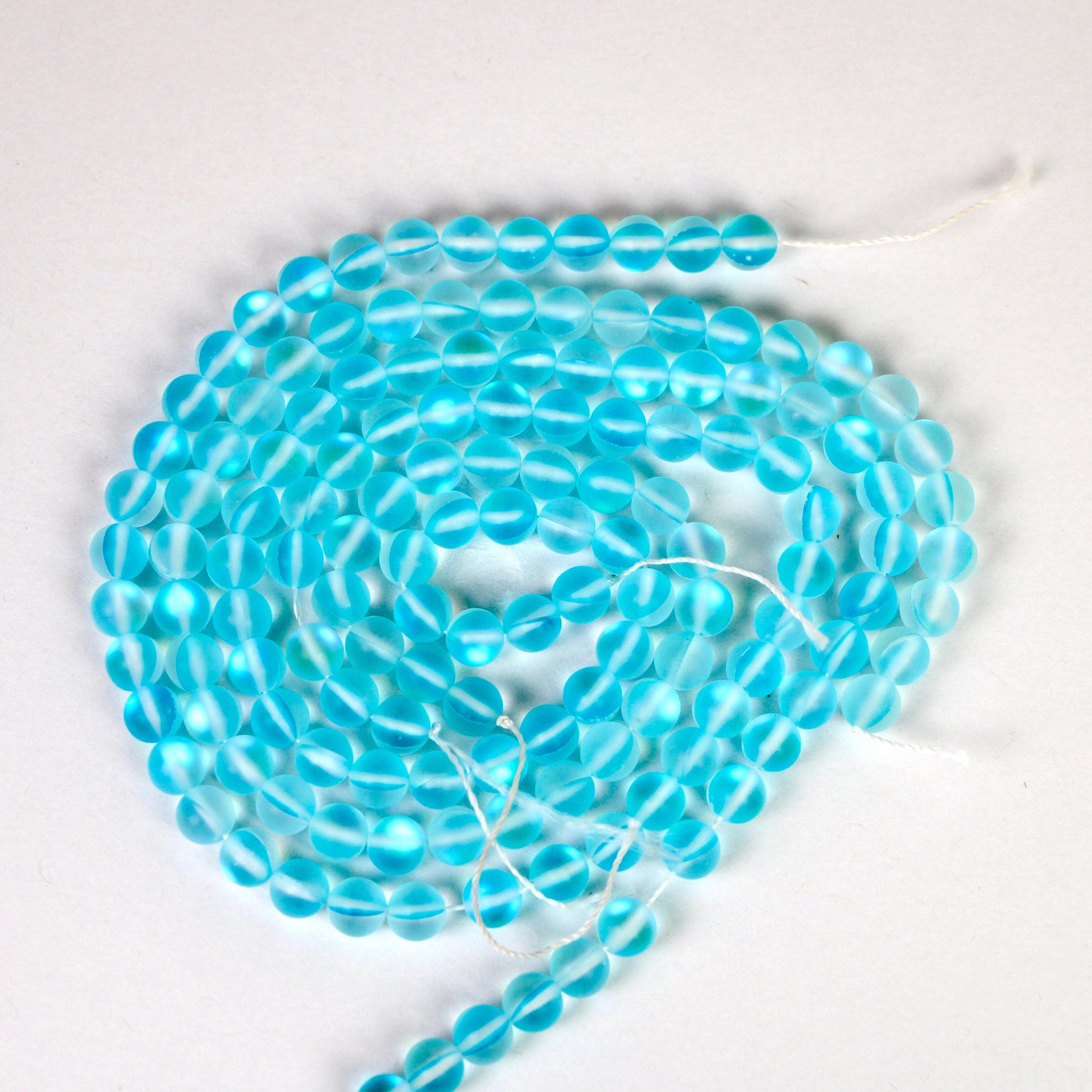 Wholesale 5 strands of Aqua Blue Aura Quartz Gemstone Beads, Matte Blue Mystic Aura Quartz, round 8 mm beads 15 inches strand | Healing Crystal - Healing Crystal for Energy, Meditation, and Balance